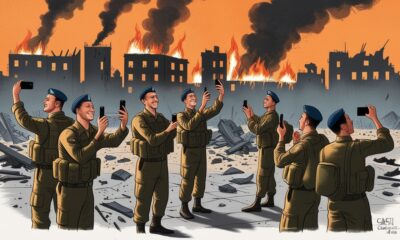 Israeli soldiers take photos as Gaza burns after the ceasefire.